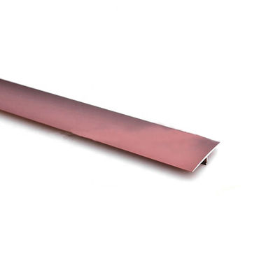 Aluminiowa listwa przejściowa w kształcie litery T do wykończenia płytek między drewnianą podłogą